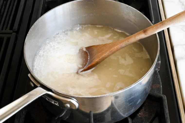 Stirring in the rice and salt