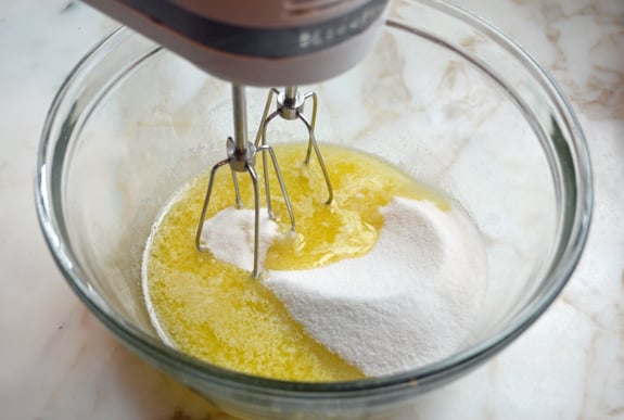 Melted butter and sugar in a bowl.