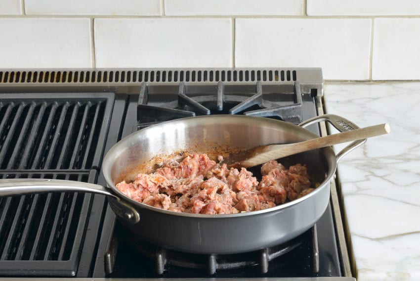 Sausage in a skillet.