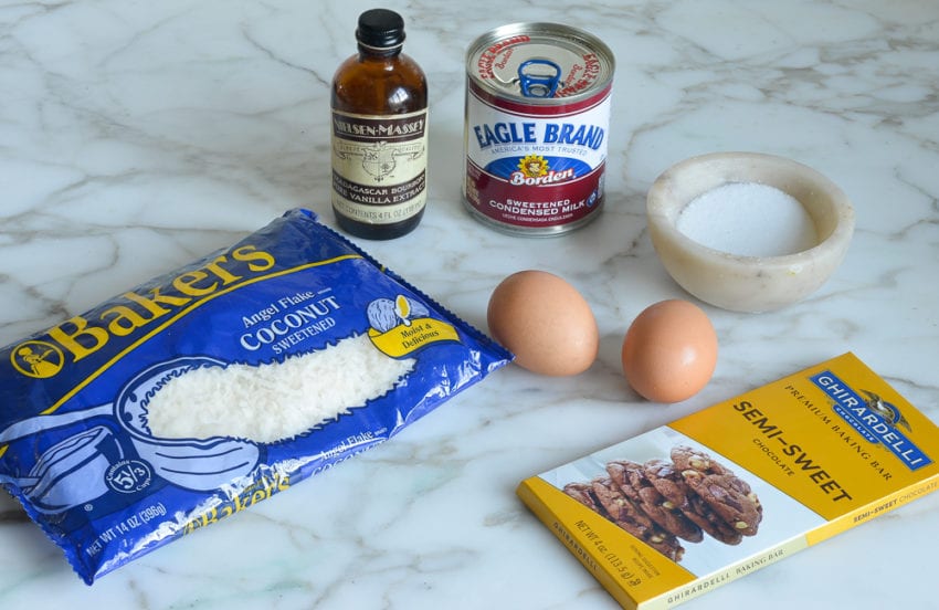 Coconut macaroon ingredients including egg, vanilla, and condensed milk.