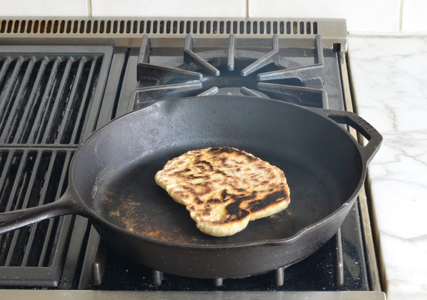 Browned dough on a skillet.