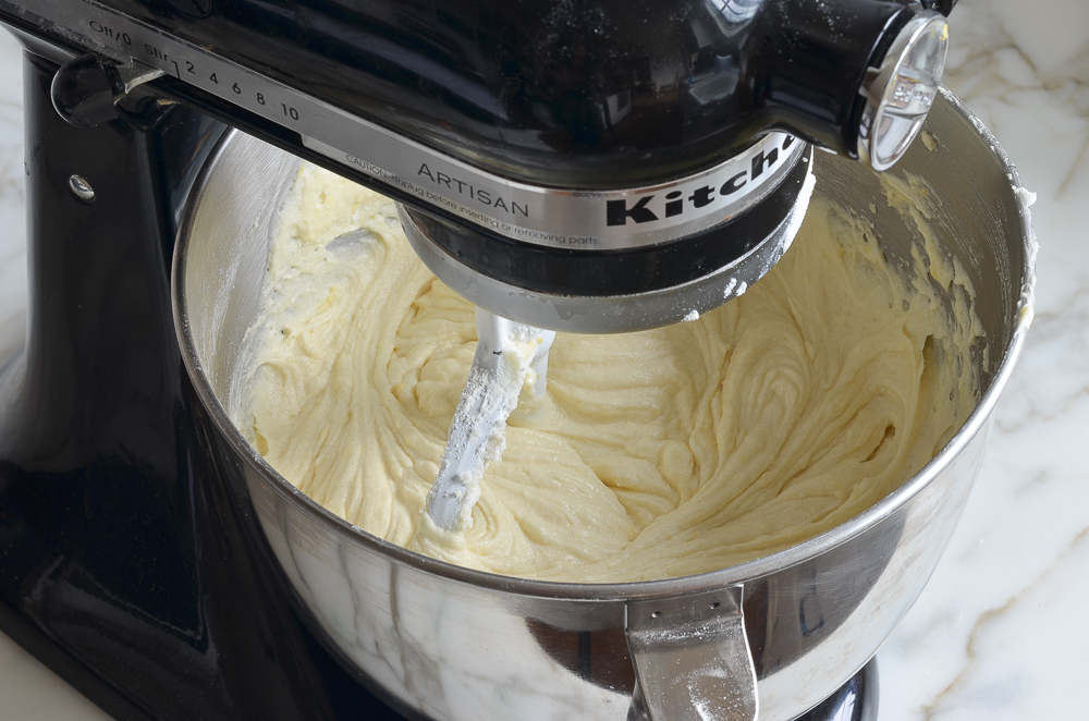 mixed lemon pound cake batter in mixer