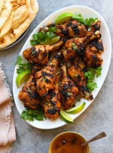 Serving platter of tandoori chicken.