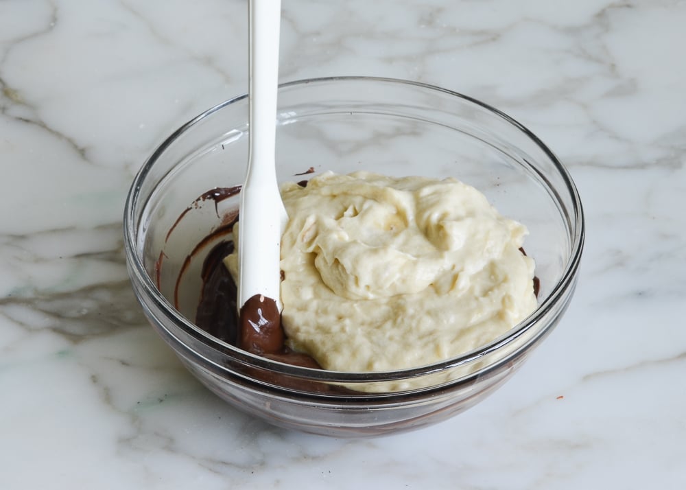 adding banana batter to chocolate