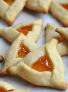 Hamantaschen on a countertop.
