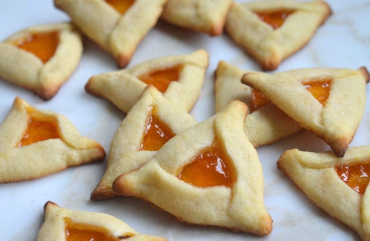 Hamantaschen on a countertop.