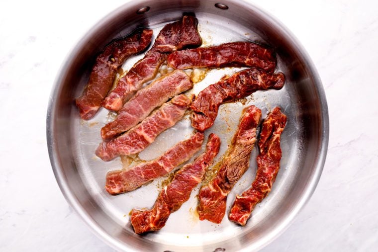 cooking beef in pan