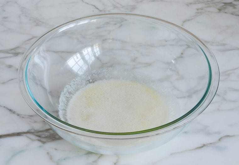 Glass bowl of melted butter.