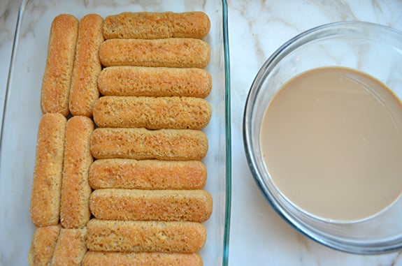 Baking dish lined with ladyfingers.