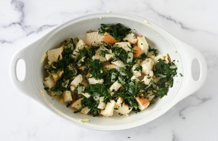 layering spinach mixture in baking dish