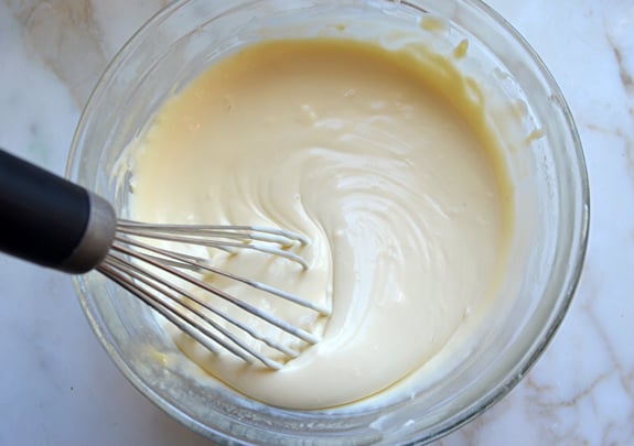 Whisk in a bowl of cream.