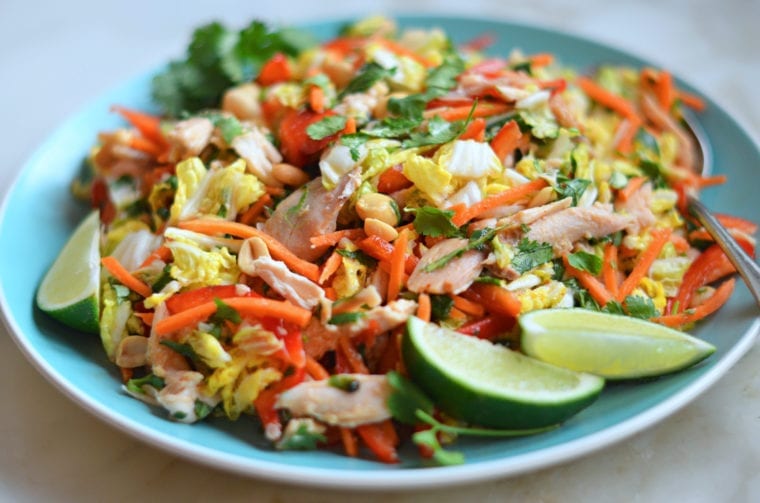 Shredded Vietnamese chicken salad on a blue plate.