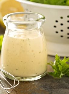 Small glass of creamy Greek yogurt dressing.