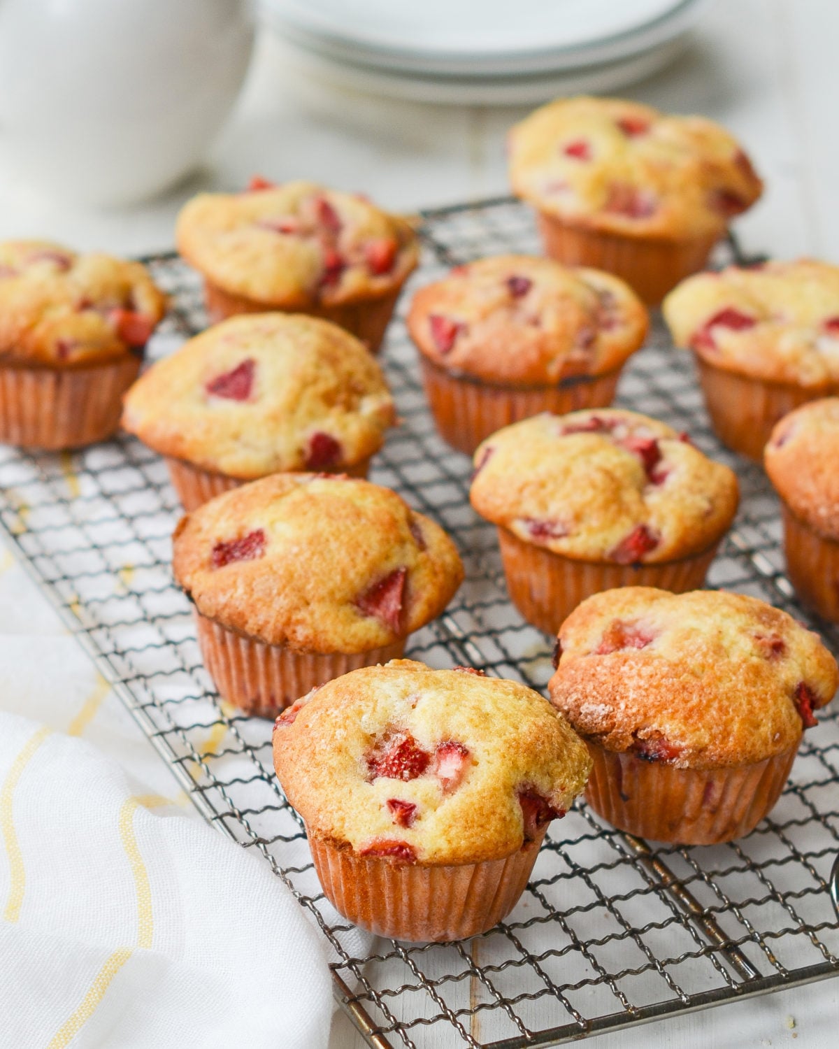 Strawberry Muffins on a wire rack.