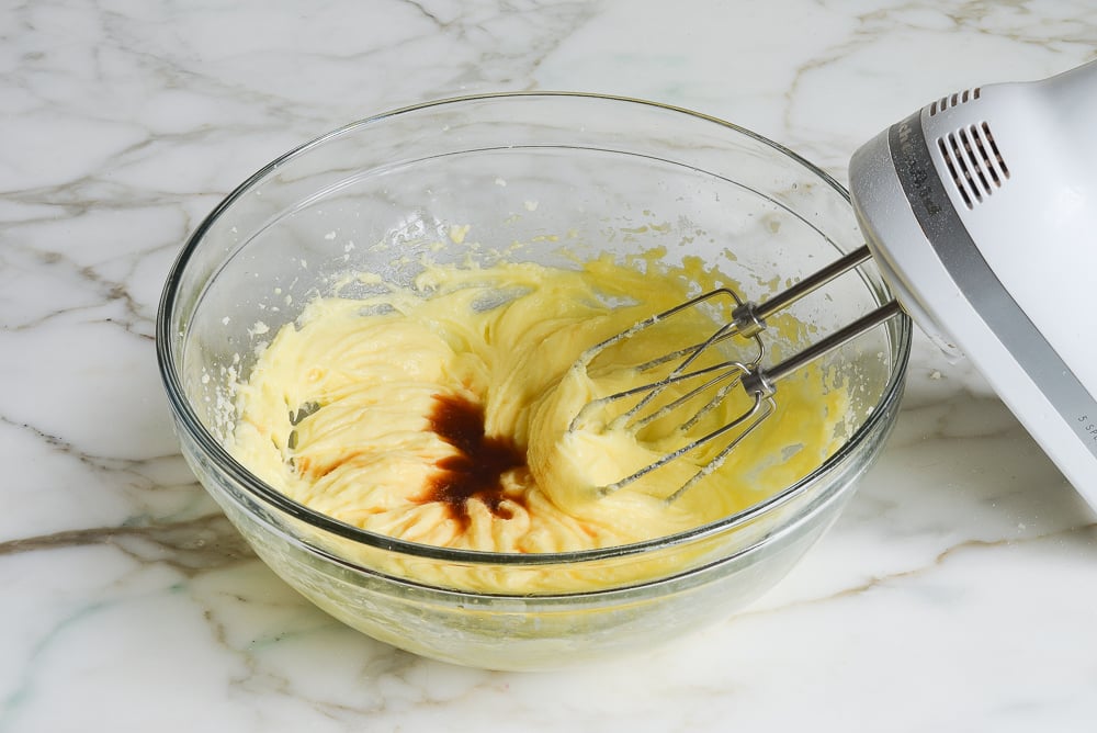 add the almond and vanilla extracts