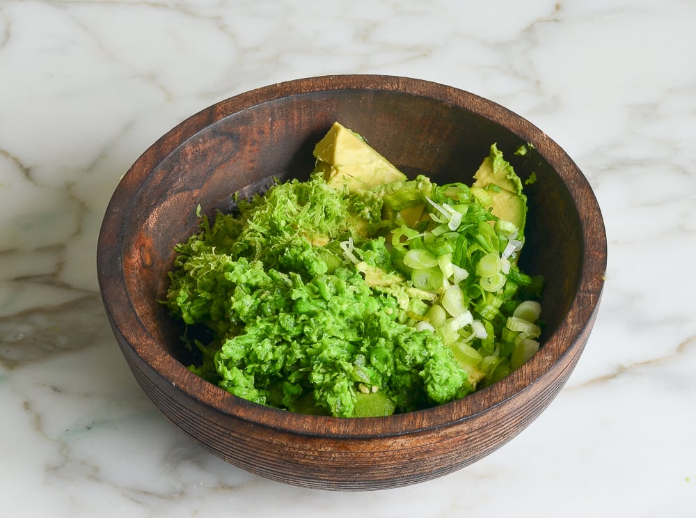 all ingredients for guacamole ready to mix