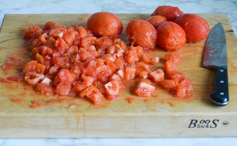 cutting the tomatoes