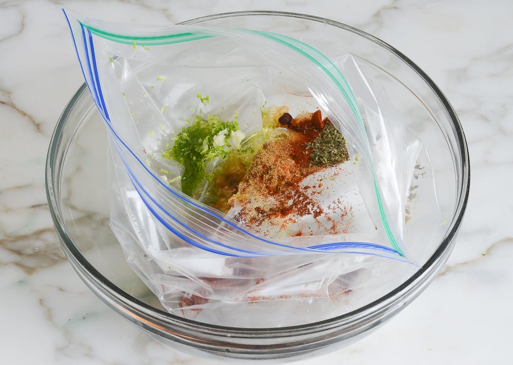 chicken fajitas marinade ingredients in bowl