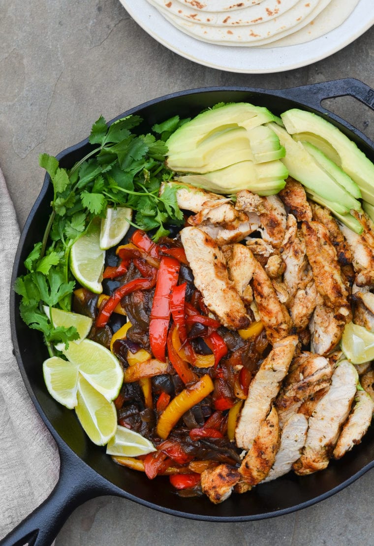 Skillet of chicken fajita fixings.