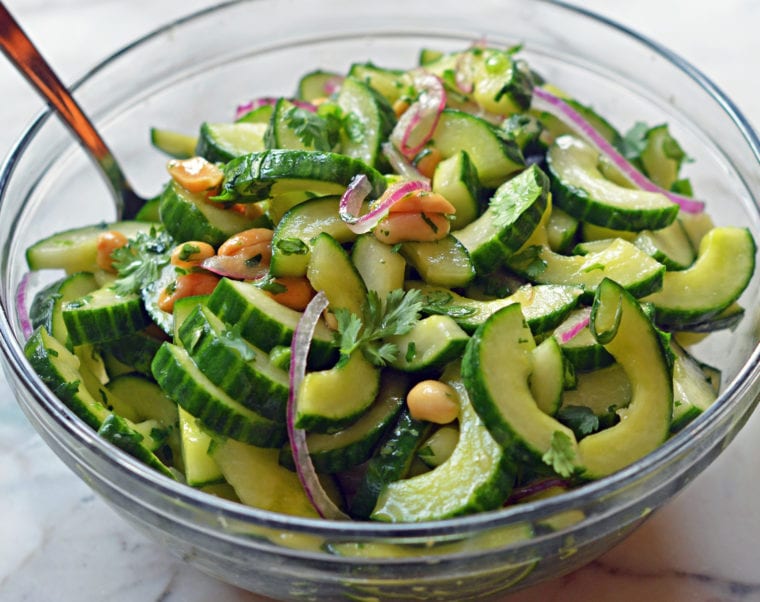 Thai cucumber peanut salad in a glass bowl.