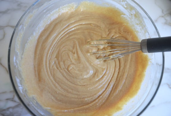 Whisk in a bowl of muffin batter.