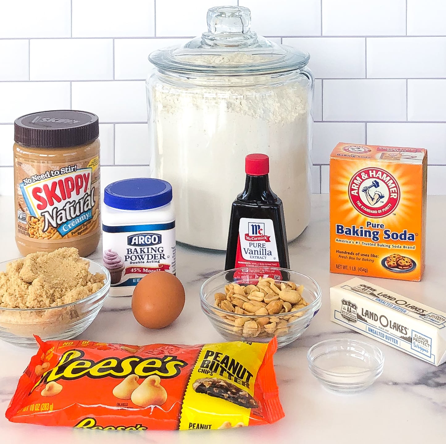 Ingredients for peanut butter cookies on a counter.