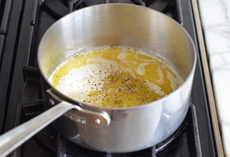 Adding the maple syrup, milk, and seasoning to the melted butter