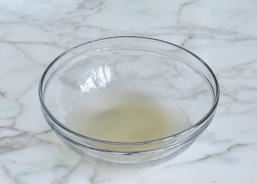 Bowl of grape juice and gelatin.