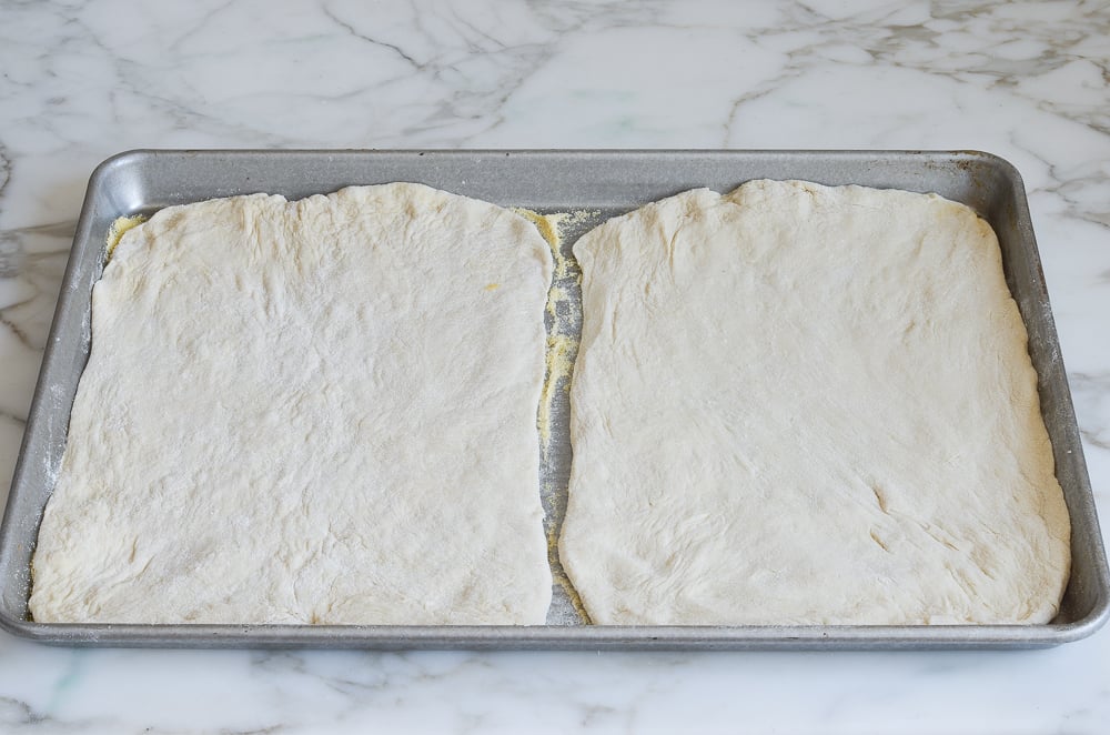 pizza dough on pan