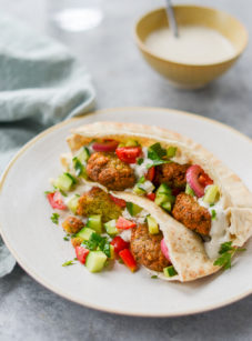 Falafel in pita on a plate.