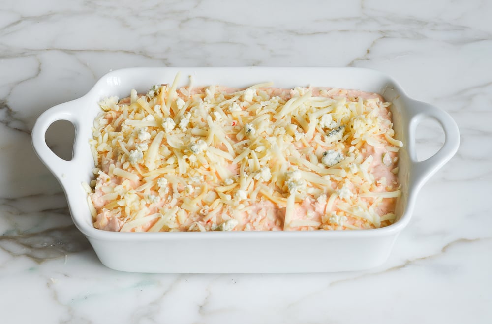 cheese sprinkled on top, ready to bake
