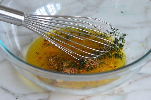 Whisk in a bowl of marinade.