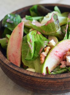 Salad topped with a cranberry Dijon vinaigrette.