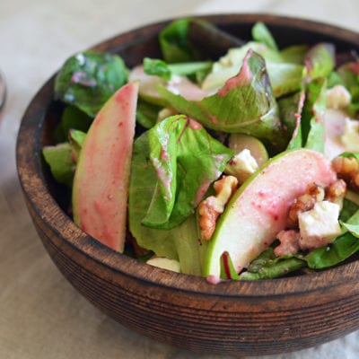 Salad topped with a cranberry Dijon vinaigrette.