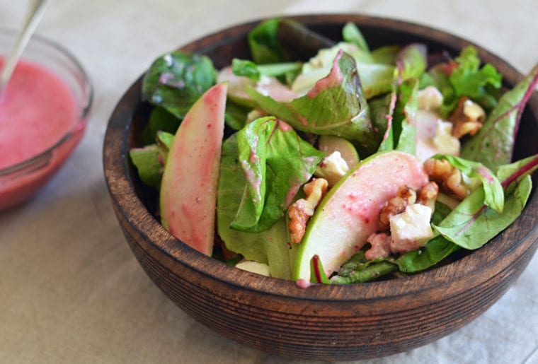 Salad topped with a cranberry Dijon vinaigrette.