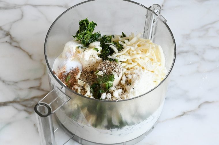 spinach and sauce ingredients in food processor