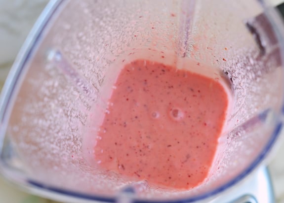 Cranberry-dijon vinaigrette in a blender.