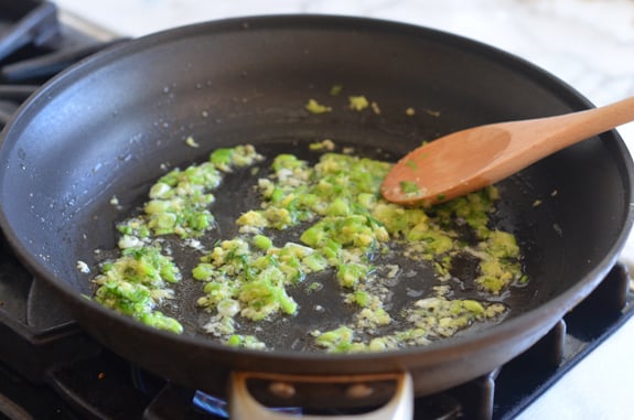Skillet of garlic, scallions, and ginger.