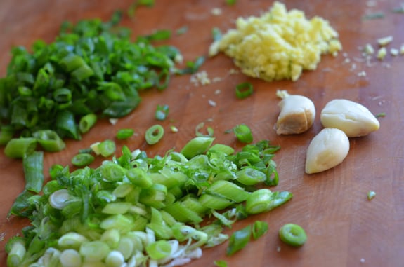 Chopped vegetables on a wooden board.
