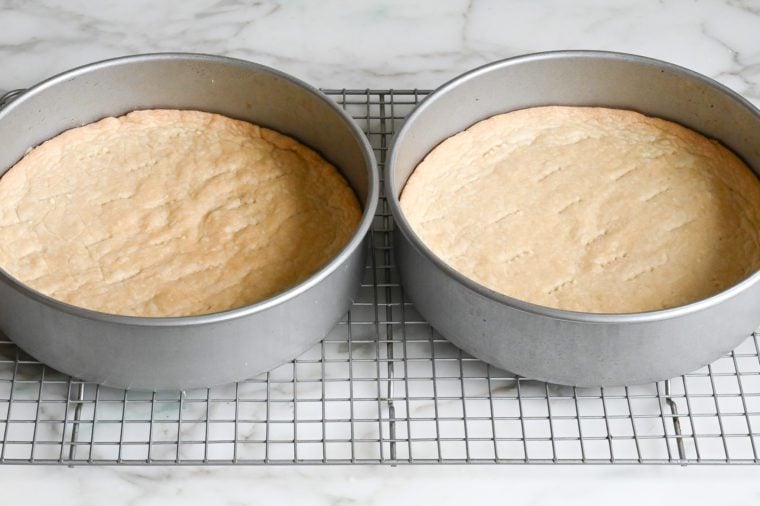 shortbread rounds cooling on rack in pans
