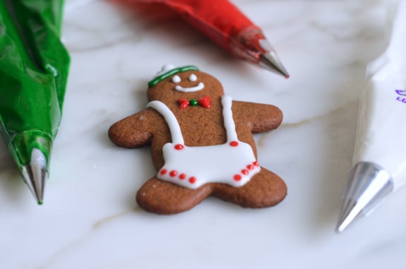 Gingerbread man decorated with royal icing lederhosen.