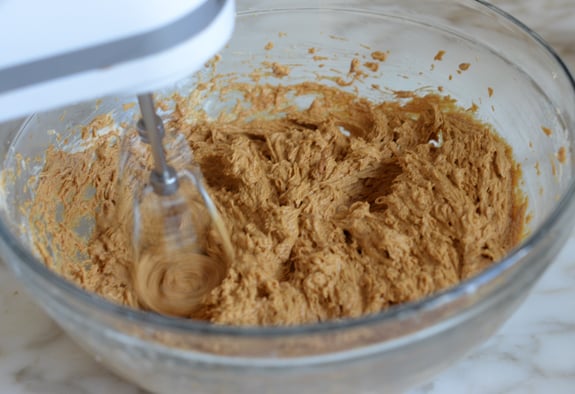 beating in egg and molasses