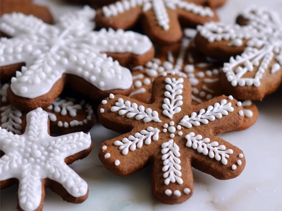 Snowflake cookies decorated with royal icing.