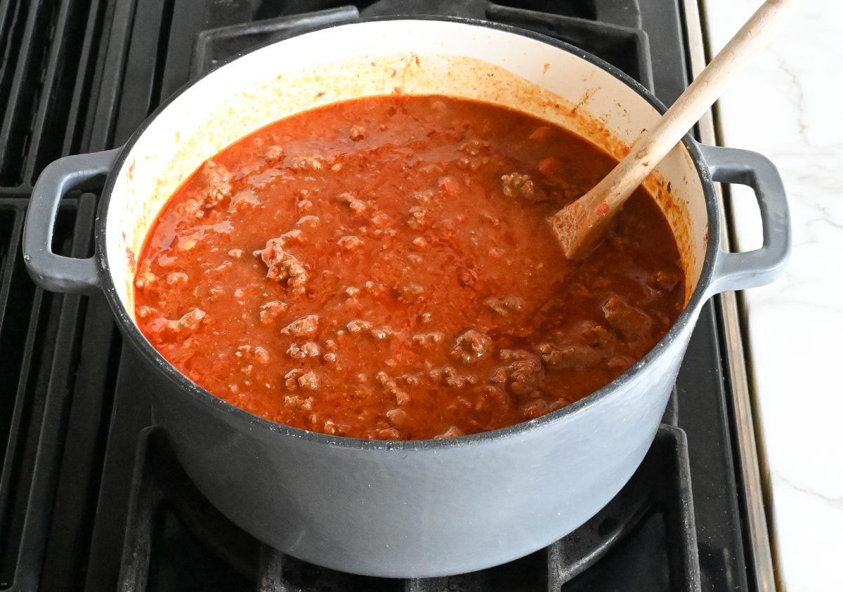 Chili simmering on a stovetop.