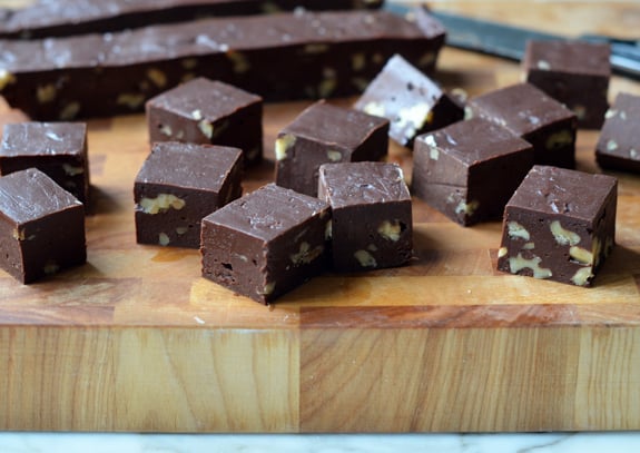 Pieces of fudge on a cutting board.