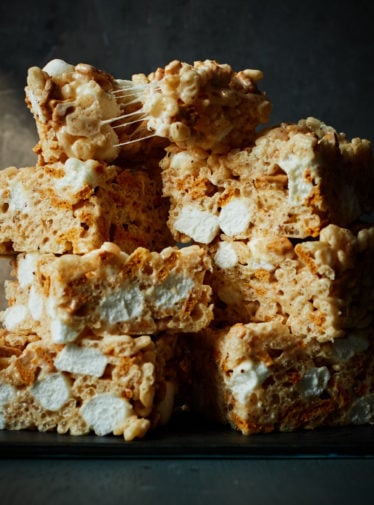 Stack of golden rice Krispie treats.