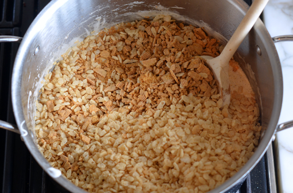 Cereal in a pot with marshmallow mixture.