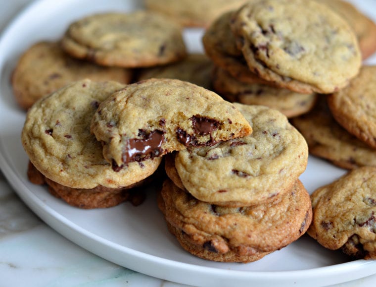 chocolate chunk cookies stacked on plate