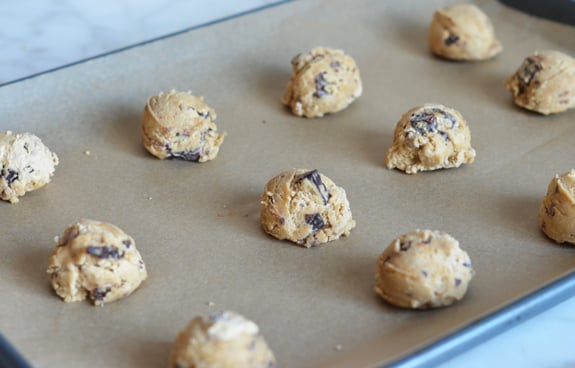 scooped chocolate chunk cookie dough ready to bake 