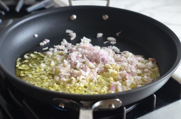 Shallots and garlic in a skillet.